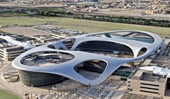 Aerial view of Zayed University’s futuristic campus building.