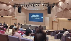 Students sitting in a lecture hall.